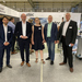 Gruppenbild am Messestand von atec